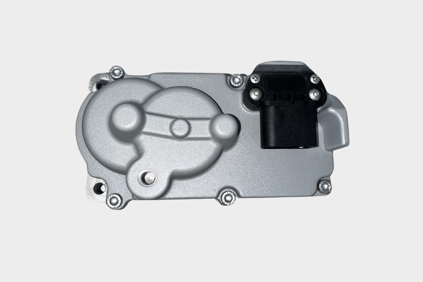 The 300143002JT Just Turbo Turbocharger Actuator is a rectangular metallic automotive part featuring a black plastic electrical connector, shown from above against a plain light background.
