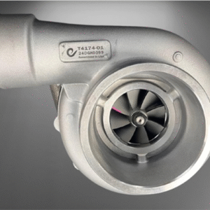 A T4174-01 Zeki Turbocharger HT3B with visible turbine blades and a metal tag showing part numbers and manufacturer details, set against a gradient gray background.