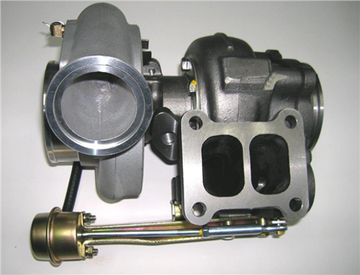 Close-up view of the T4913-01 Zeki Turbocharger HX40W, displaying its turbine housing, compressor housing, actuator, and mounting flanges on a white background.