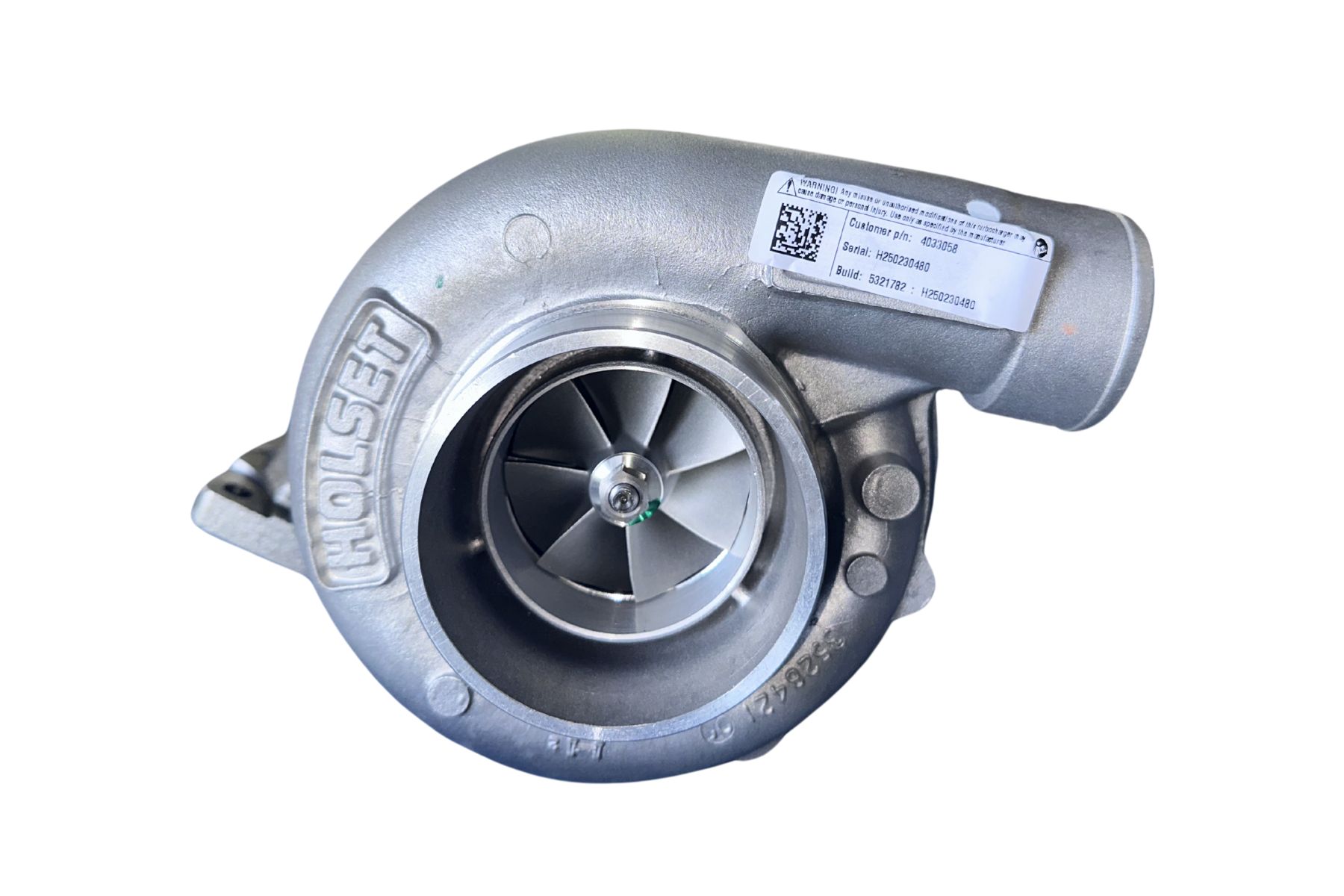 The 4033058H Kit, Fixed Geometry Turbo, HX50 by Holset features a visible compressor wheel and part identification label, photographed against a white background.