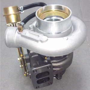 The T4104-01 Zeki Turbocharger HX35W with included gasket is displayed on a gray surface, featuring its metallic compressor and turbine housing assembly with an attached actuator.